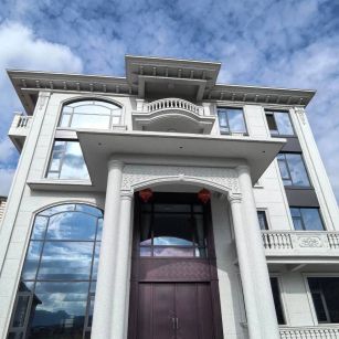 内江白麻别墅外墙干挂石材效果示例