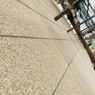 内江 黄金麻花岗岩荔枝面外墙干挂石材效果示例