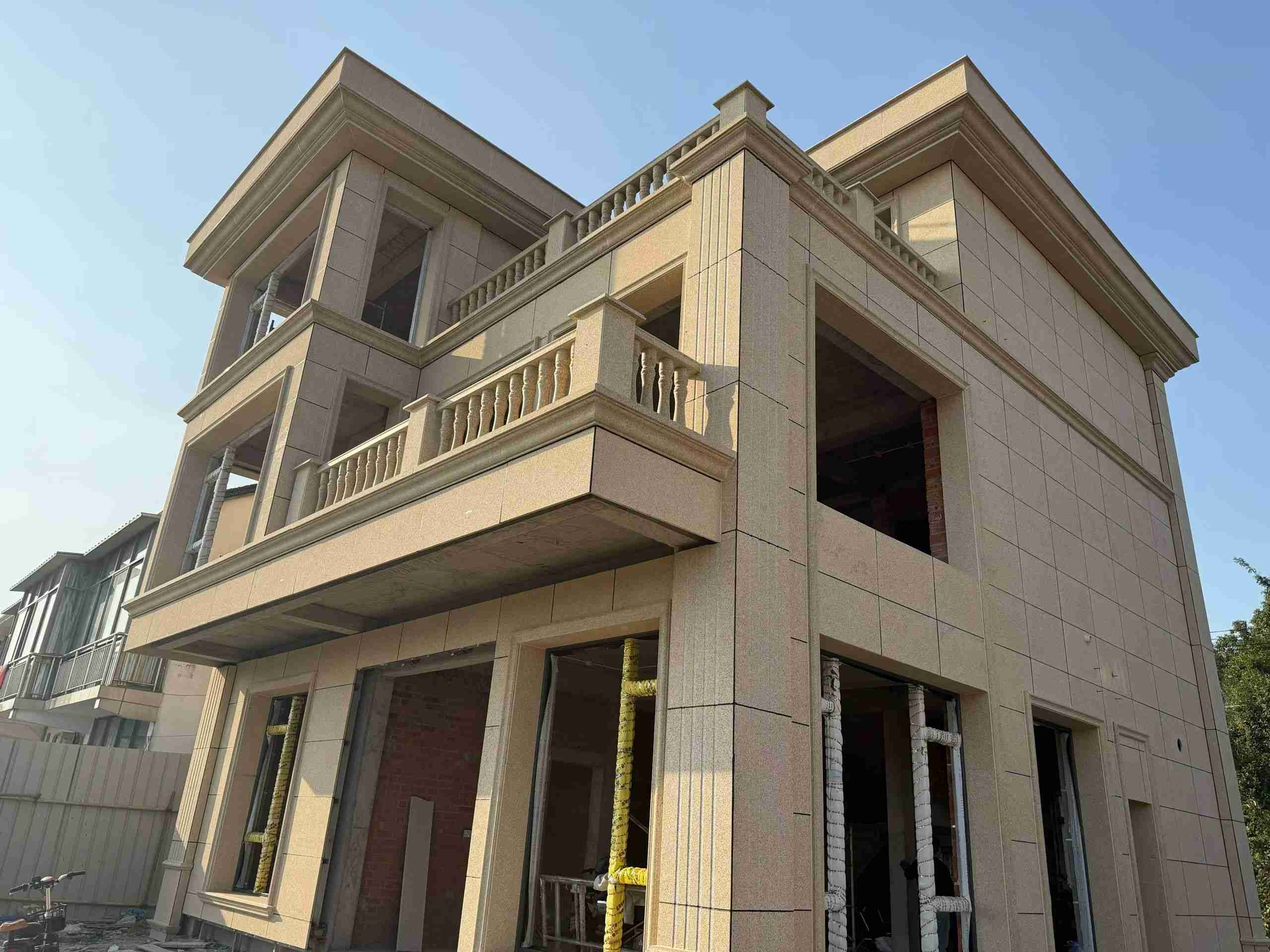 内江 黄金麻花岗岩石材荔枝面外墙干挂效果展示